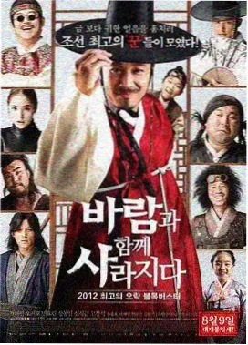 幕后工作照，剪辑台上并排摆放的色卡与遥控器